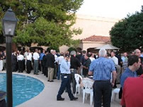 Attendees discuss the day's topics at the Networking Reception